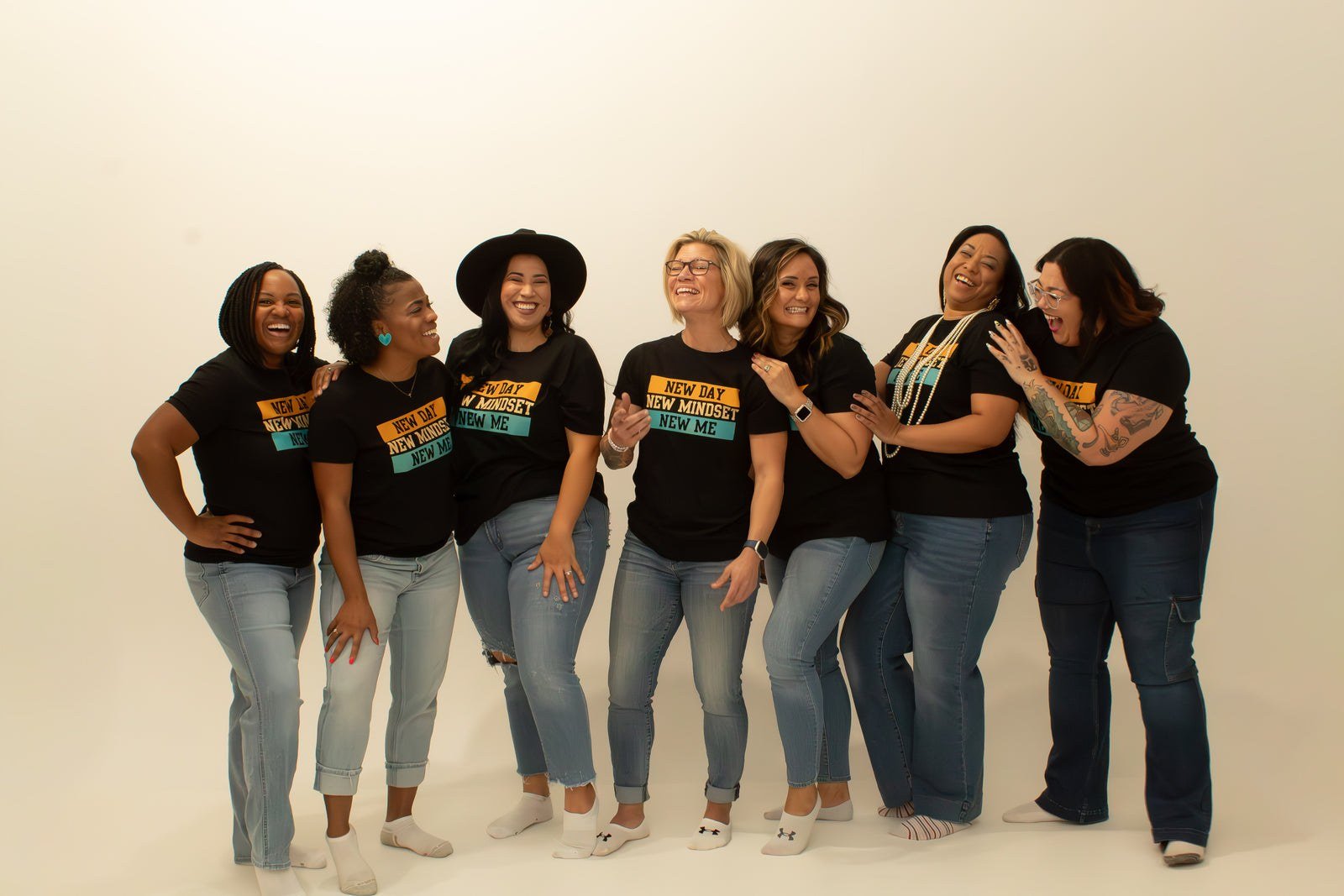 EmpowerHer, LLC — women wearing New Day New Mindset New Me shirts