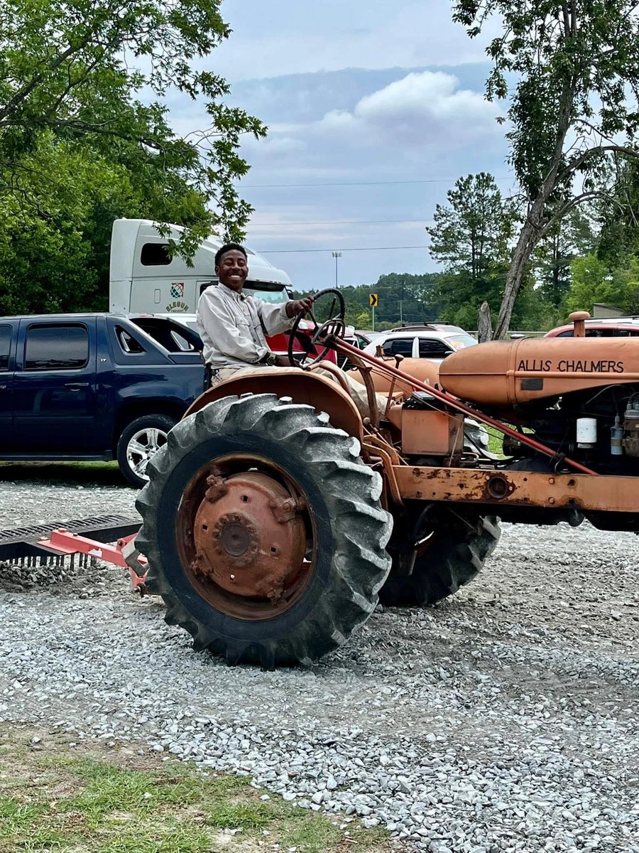 Second-generation farmer — on the family Allis-Chalmers